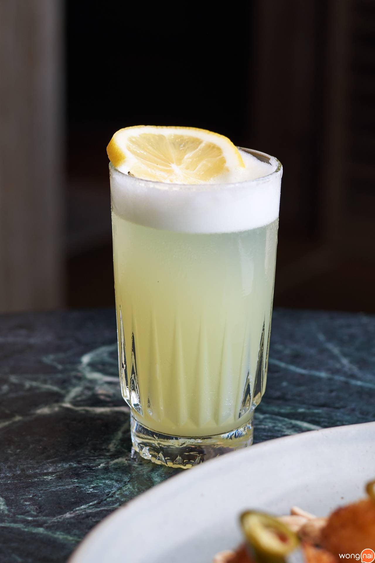 เมนู “Local Tangerine Gin Fizz” ของ "SIWILAI CITY CLUB"