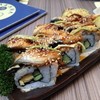 Dragon Avocado Roll (320.-)