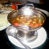  ส้มตำคอหมูย่างหม้อไฟ