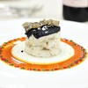 Truffle crusted sea bass with parmesan cheese and lemon confit