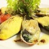 Baked Blue Mussel on Spinach with Cream Cheese and Hollandaise Sauce