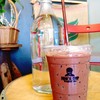 A cup of CoCoa with the logo