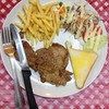 สเต็กหมู เสริฟพร้อม ขนมปัง เฟรนฟราย สลัด