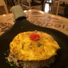 ข้าวผัดหนวดหมึกยักษ์หน้าไข่นุ่ม