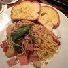 Spaghetti Ham, Bacon, Cheese Au Gratin served Garlic Bread