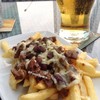 French Fries Topped With Cheese, Beef & Peanuts 