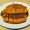 ข้าวห่อไข่หน้าหมูทอดราดซอสแกงกระหรี่ไข่ลาวา (210+20บาท) 