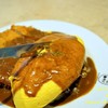 ข้าวห่อไข่หน้าหมูทอดราดซอสแกงกระหรี่ไข่ลาวา (210+20บาท) 