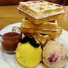 waffle tall with caramel and ice cream earlgray raspberry and mango passion