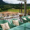 ที่นั่งริมระเบียง ด้านล่างกำลังสร้าง เสร็จแล้วคงสวยงามน่าดู
