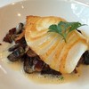 Seared Chilean seabass with mushroom - bacon ragout and yuzu ponzu