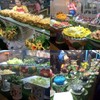 หมูสะเต๊ะ ผักต่างๆ ผลไม้สดผลไม้เอง แล้วขนมหวานหลายหน้ามาก