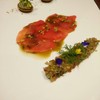 Salmon Tartar On Bed Of Tuna Carpaccio With Lime&green Wasabi Dressing And Veget