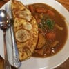 ข้าวห่อไข่ราดแกงกะหรี่ 75฿ น้ำแกงหวานเลี่ยนมาก
