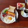 2 Toast with Butter and Jam , 2 Eggs , 2 Bacons , Fesh Fruit Salad & Coffee 