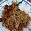 ผัดกระเพราไก่จ๊อท๊อปปิ้งด้วยไข่ลวก
