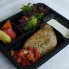 Grilled pork loin with mustard cream sauce served with salad, seasonal fruit and 1 bottle of orange juice Grilled pork loin with mustard cream sauce served with salad, seasonal fruit and 1 bottle of orange juice