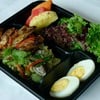 Green curry fried rice with grilled chicken served with boiled egg, salad and seasonal fruit and 1 bottle of orange juice Green curry fried rice with grilled chicken served with boiled egg, salad and seasonal fruit and 1 bottle of orange juice