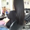 พนักงานในร้านยืดผมให้สวย ผมตรงตามที่ต้องการ