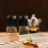 Seared Hokkaido scallops served with truffle paste, whipping cream, sliced potat