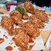 ปีกไก่เกาหลีรสเผ็ดและหวาน (กับ) ปีกไก่เกาหลีรสเผ็ดและหวาน (กับ)