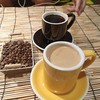 Very fragrant, dark roasted chocolate americano in a 300 ml cup