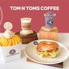 TOM N TOMS COFFEE G Tower