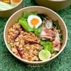 เนื้ออกไก่สับเคล้าด้วยลาบเข้มข้น พร้อมด้วยเบคอนพันเห็ดเข็มทองและไข่ต้ม