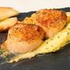 Japanese dscallops pan seared over potato mousse and served with salmon caviar