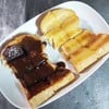 ขนมปังปิ้งเนยนม-เนยช๊อกโกแลต (ชิ้นละ 15.-)
