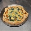 Spinach and cheese pizza