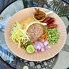 ข้าวคลุกกะปิ เมนูซิกเนเจอร์ของทางร้าน ข้าวคลุกกะปิห่อไข่ พร้อมเครื่องเคียง 9ชนิด