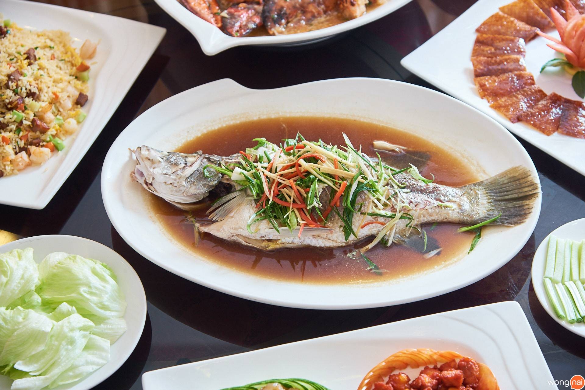 “ปลากะพงนึ่งซีอิ๊ว” ของร้าน Ho Kitchen Seafood