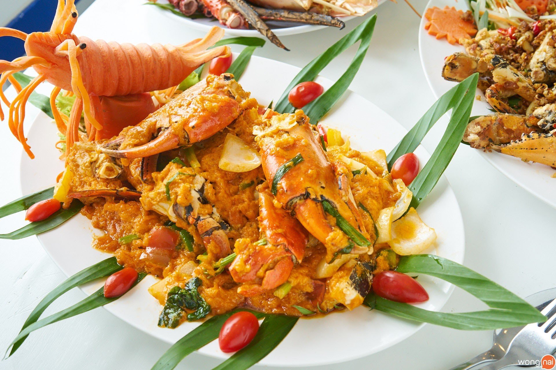 ปูเนื้อผัดผงกะหรี่ ของร้าน อุดม ซีฟู้ด
