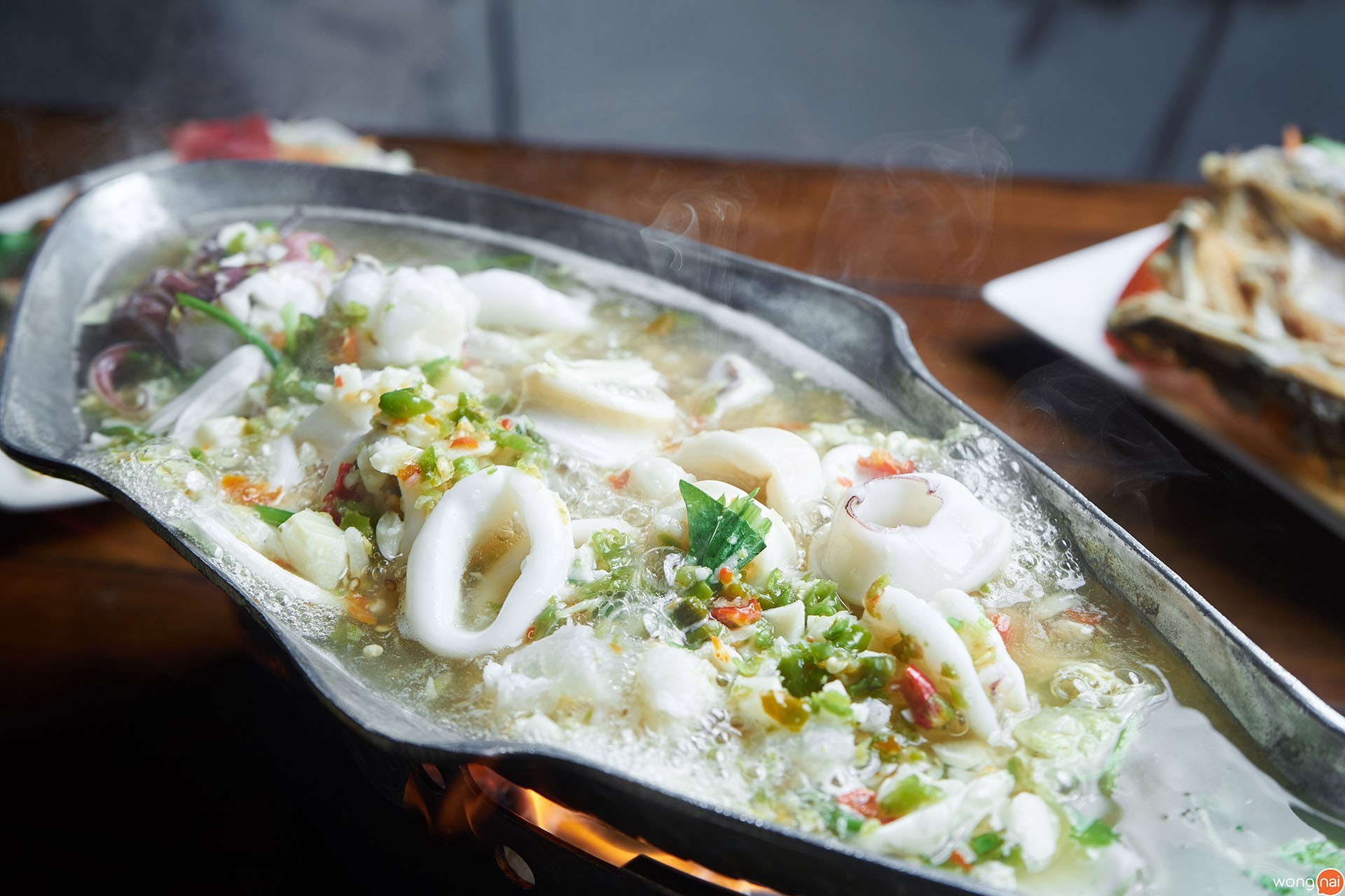ปลาหมึกไข่นึ่งมะนาว ของร้าน 61 Cozy Garden Bistro