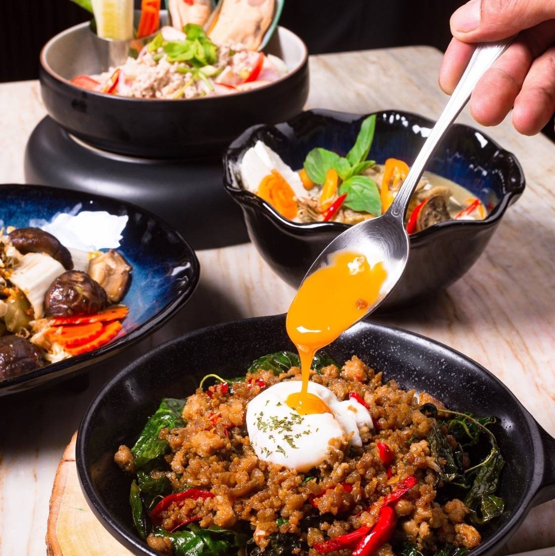 Set (2) กระเพราหมู ยำ ผัดผัก แกง 45 ท่าน • image ร้าน Tuba Design