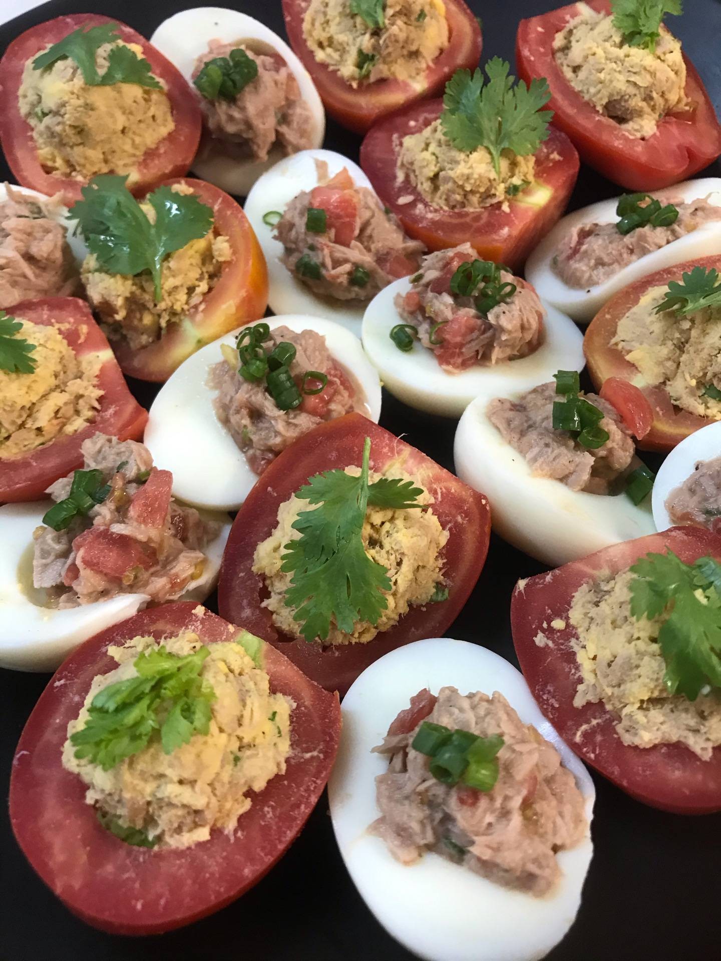 Tuna salad in egg & tomato cup