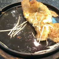 พลิกดูด้านหลัง เอิ่มม..น้ำมันท่วมอ่ะ