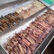 บรรยากาศ ปลาหมึกสดย่างสันติธรรม