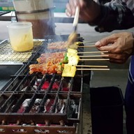 เมนูของร้าน ลูกชิ้นทอดปลาหมึกย่าง BBQ