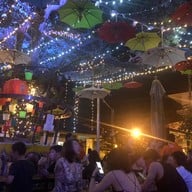 Zoe In Yellow Cocktail Bar + Restaurant