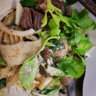 ก๋วยเตี๋ยวเนื้อตุ๋นเฮียปอ ถนนอำเภอ เมืองสุราษ
