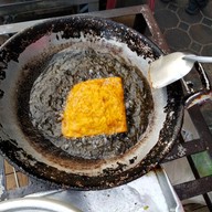 เมนูของร้าน ข้าวต้มเครื่องแอนด์กะเพราBYDUM -