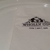 Wholly Cow Restaurant Wine & Cigar Bar