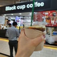 Black cup coffee All Seasons Place