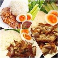 ข้าวหมูทอด ไก่ทอด ไข่ยางมะตูม