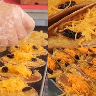 แม่เล็กขนมเบื้องไทยโบราณ (เจ้าเก่าตลาดกระทรวงการคลัง)