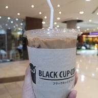 Black cup coffee All Seasons Place
