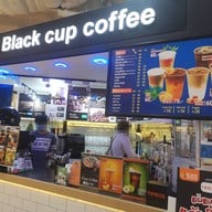Black cup coffee All Seasons Place