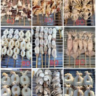 เมนู ลุงพัฒน์หมึกสดย่าง By โตโต้